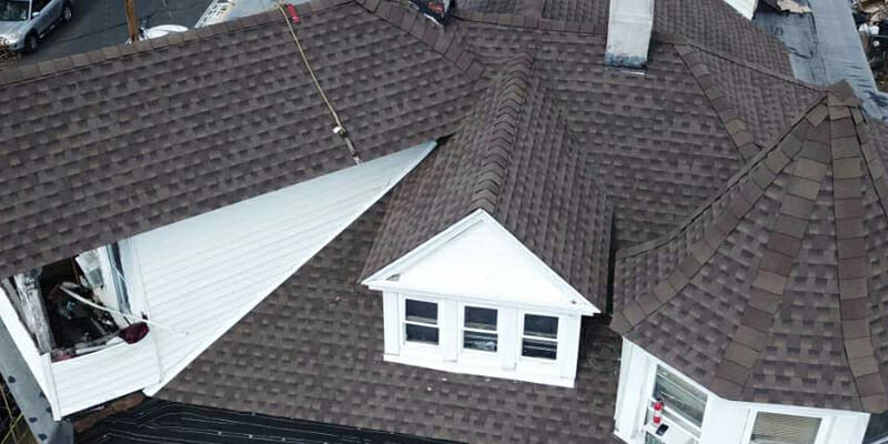 Shingle roof and dormer shown on Simple Roofing’s residential roofing page